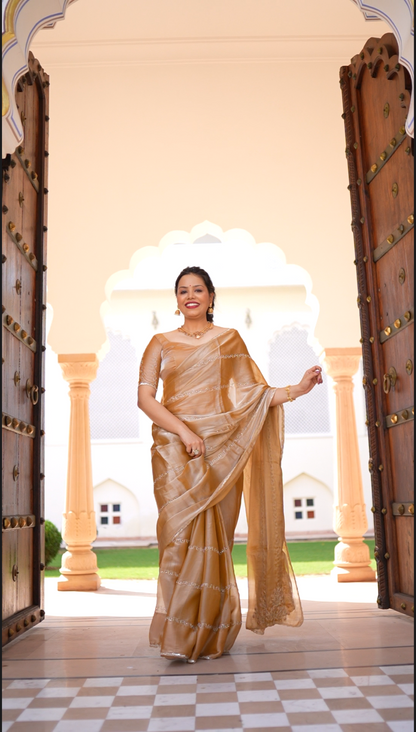 GOLD TONED SAREE FABRICATED IN TISSUE WITH CUT DANA & SEQUIN EMBELLISHED PALLA